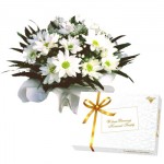 Kompozycja z margerytek wraz z bombonierką - Bukiet Komunijny