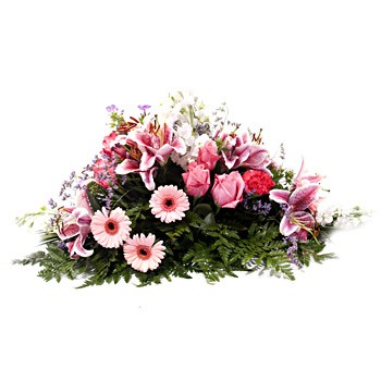 Kompozycja pogrzebowa ułożona z gerber, róż i lilii na żywym podkładzie - Wiązanka Refleksja